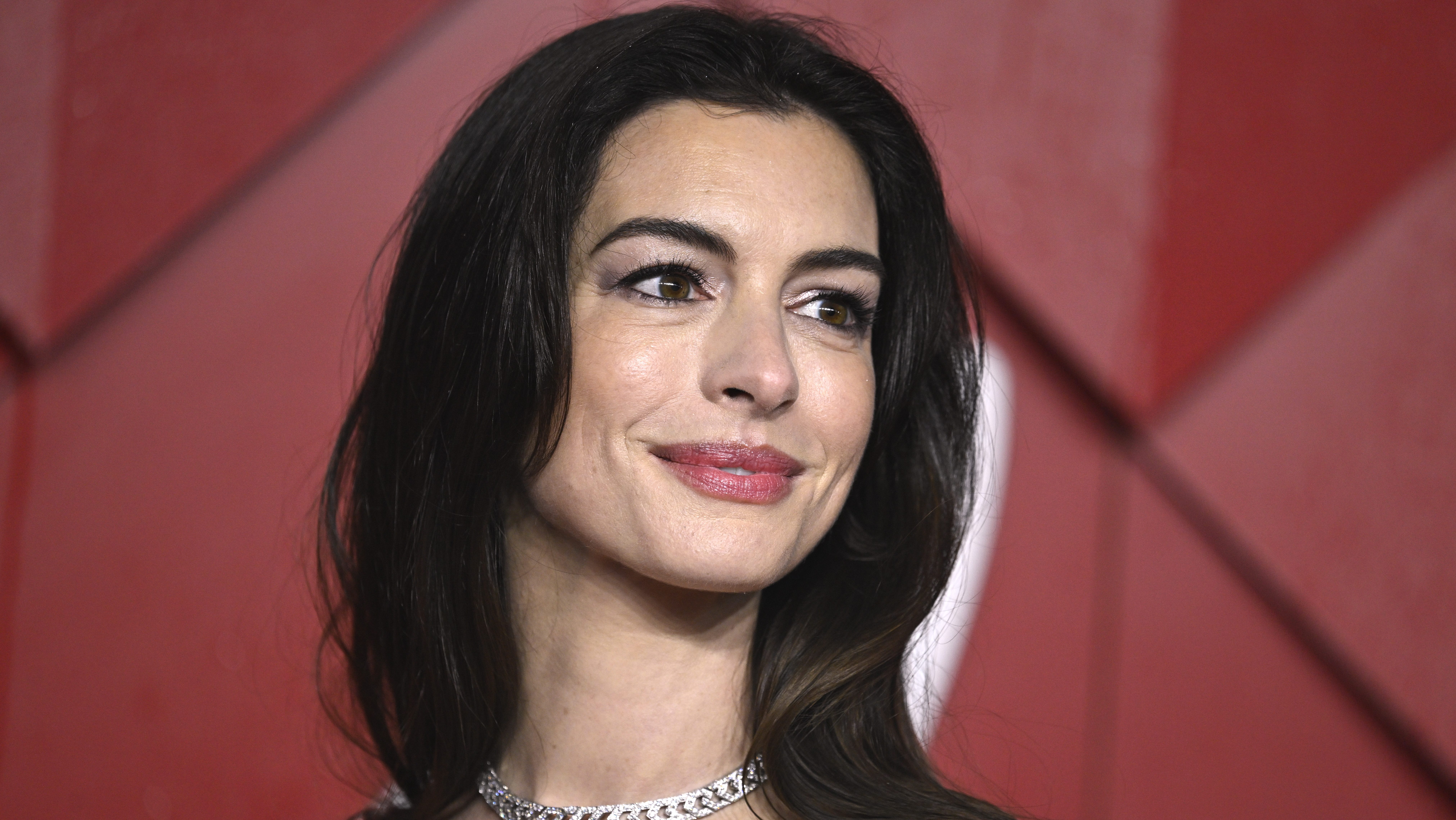 LONDON, ENGLAND - DECEMBER 04: Anne Hathaway attends The Fashion Awards 2023 presented by Pandora at the Royal Albert Hall on December 04, 2023 in London, England. (Photo by Gareth Cattermole/Getty Images)