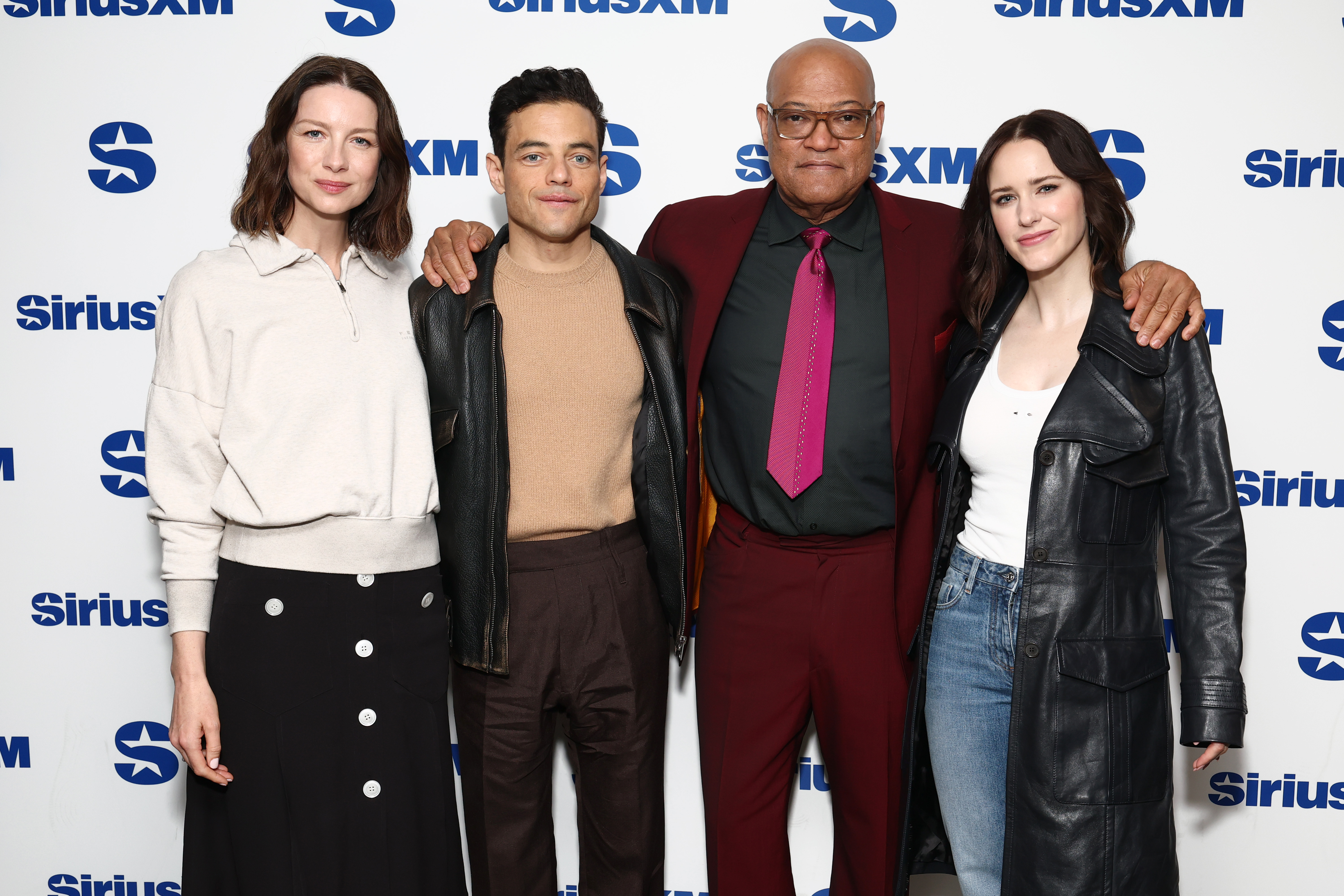 NEW YORK, NEW YORK - APRIL 03: (L-R) Caitriona Balfe, Rami Malek, Laurence Fishburne and Rachel Brosnahan attend SiriusXM's Town Hall with the cast of The Amateur hosted By Ron Bennington at SiriusXM Studios on April 03, 2025 in New York City. (Photo by Cindy Ord/Getty Images for SiriusXM)