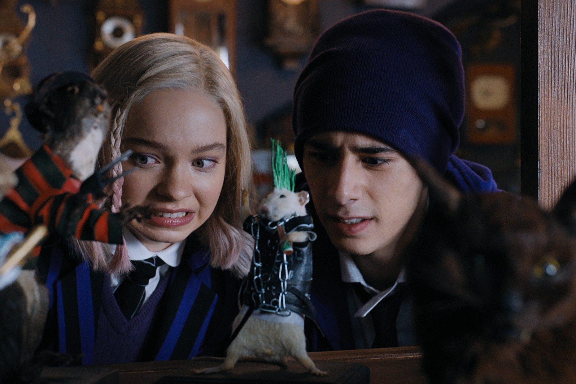 Wednesday. (L to R) Emma Myers as Enid Sinclair, Georgie Farmer as Ajax Petropolus in episode 103 of Wednesday. Cr. Courtesy of Netflix © 2022