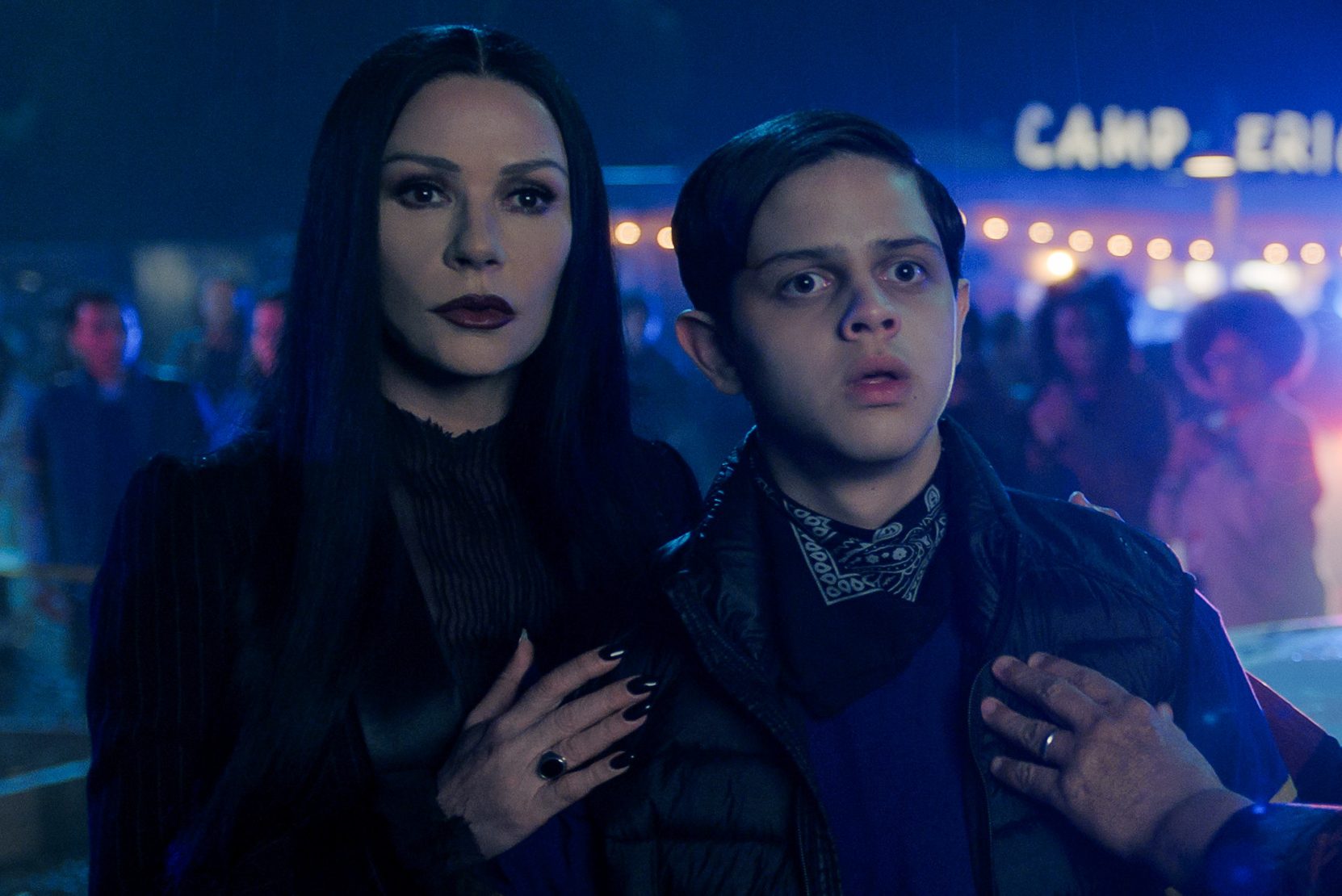 Wednesday. (L to R) Catherine Zeta-Jones as Morticia Addams, Isaac Ordonez as Pugsley Addams, Luis Guzmán as Gomez Addams in episode 203 of Wednesday. Cr. Courtesy of Netflix © 2025