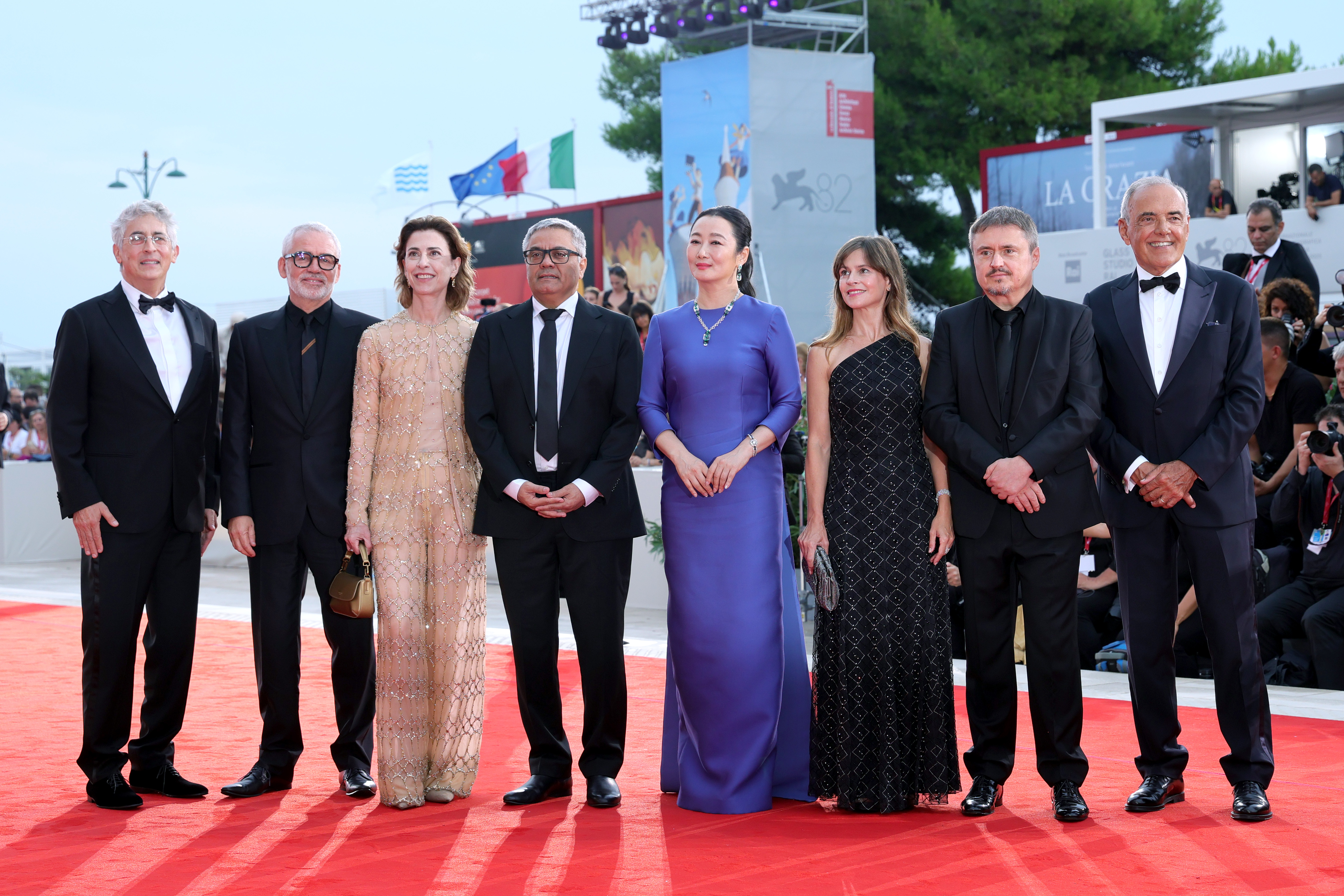 VENICE, ITALY - AUGUST 27: President of the 82nd Venice International Film Festival Alexander Payne, jury members Stéphane Brizé, Fernanda Torres, Mohammad Rasoulof, Zhao Tao, Maura Delpero, Cristian Mungiu and  Director of the 82nd Venice Film Festival Alberto Barbera attend the "La Grazia" red carpet during the 82nd Venice International Film Festival on August 27, 2025 in Venice, Italy. (Photo by Vittorio Zunino Celotto/Getty Images)