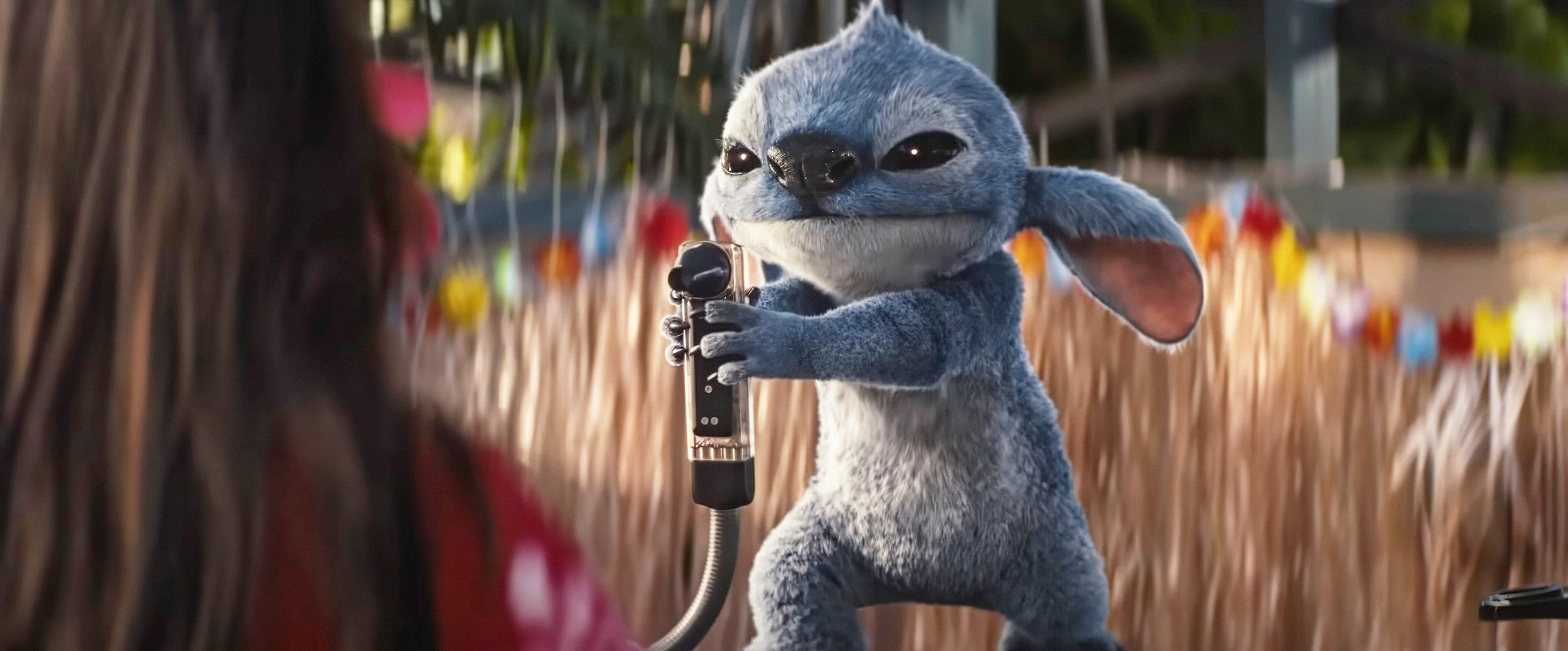 LILO & STITCH, (aka LILO AND STITCH), from left: Maia Kealoha, Stitch (voice: Chris Sanders), 2025. © Walt Disney Studios Motion Pictures / Courtesy Everett Collection