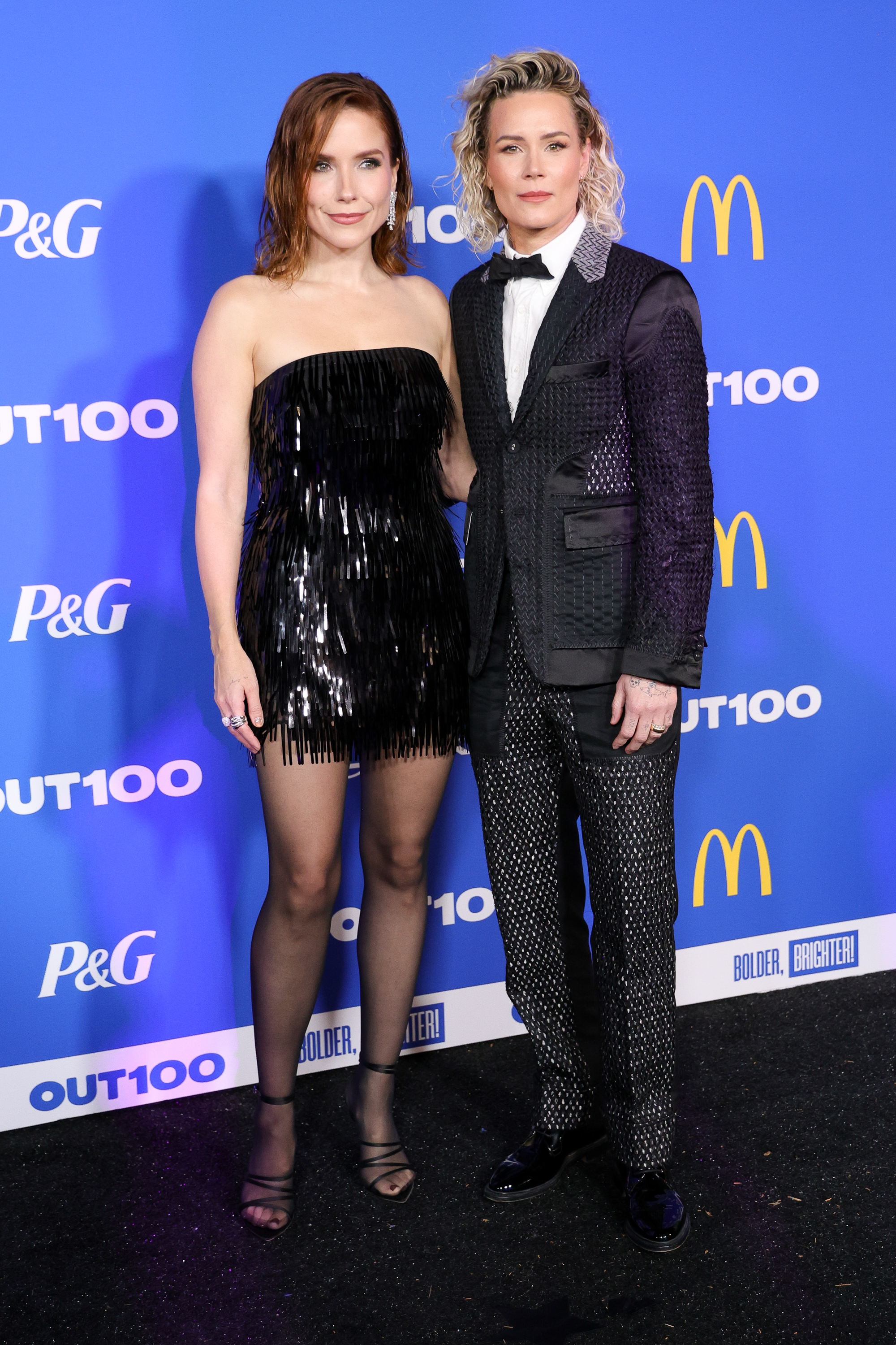Sophia Bush and Ashlyn Harris at the OUT100 Celebration held at nya Studios West on November 21, 2025 in Los Angeles, California.