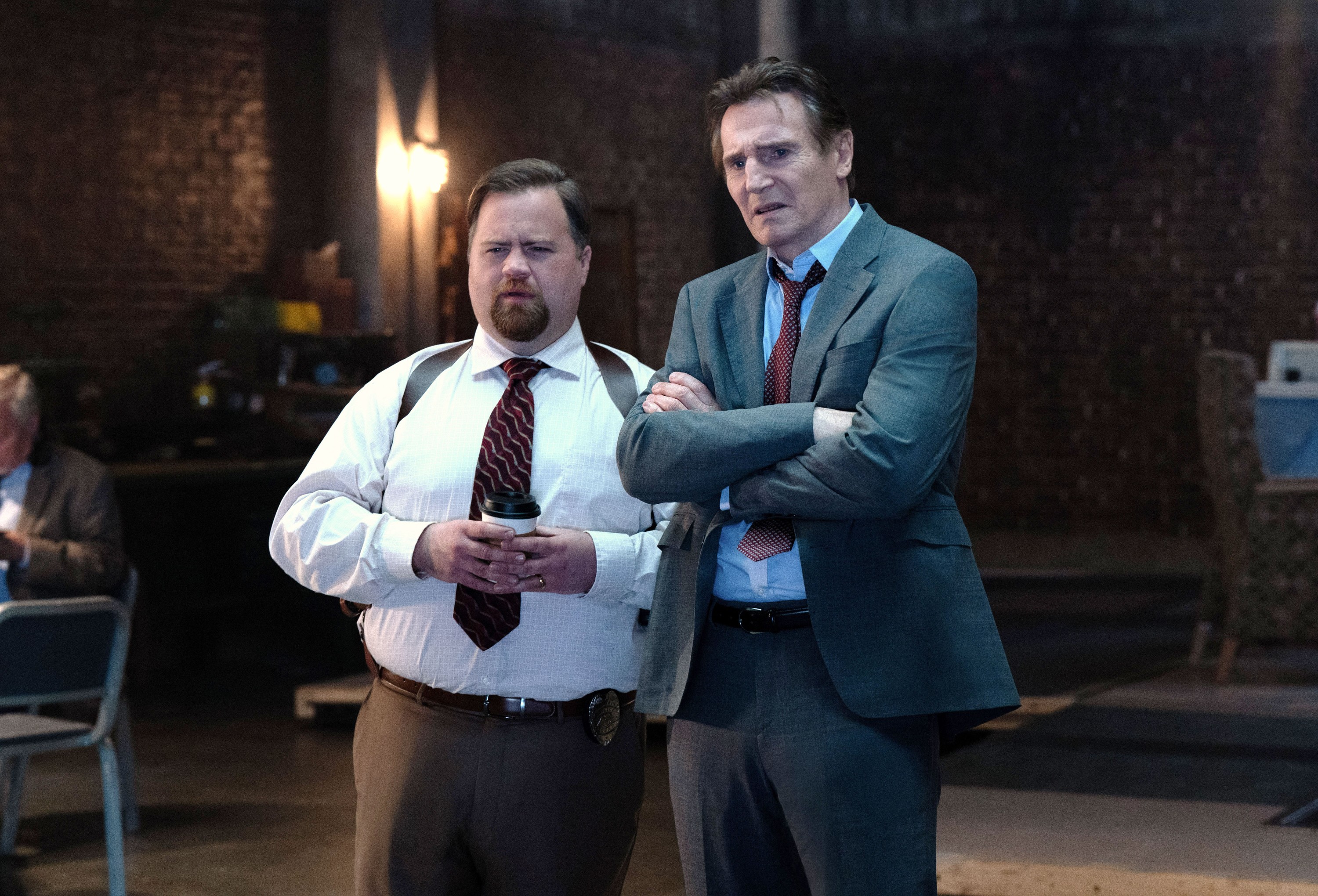 THE NAKED GUN, from left: Paul Walter Hauser, Liam Neeson, 2025.  ph: Frank Masi /© Paramount Pictures /Courtesy Everett Collection