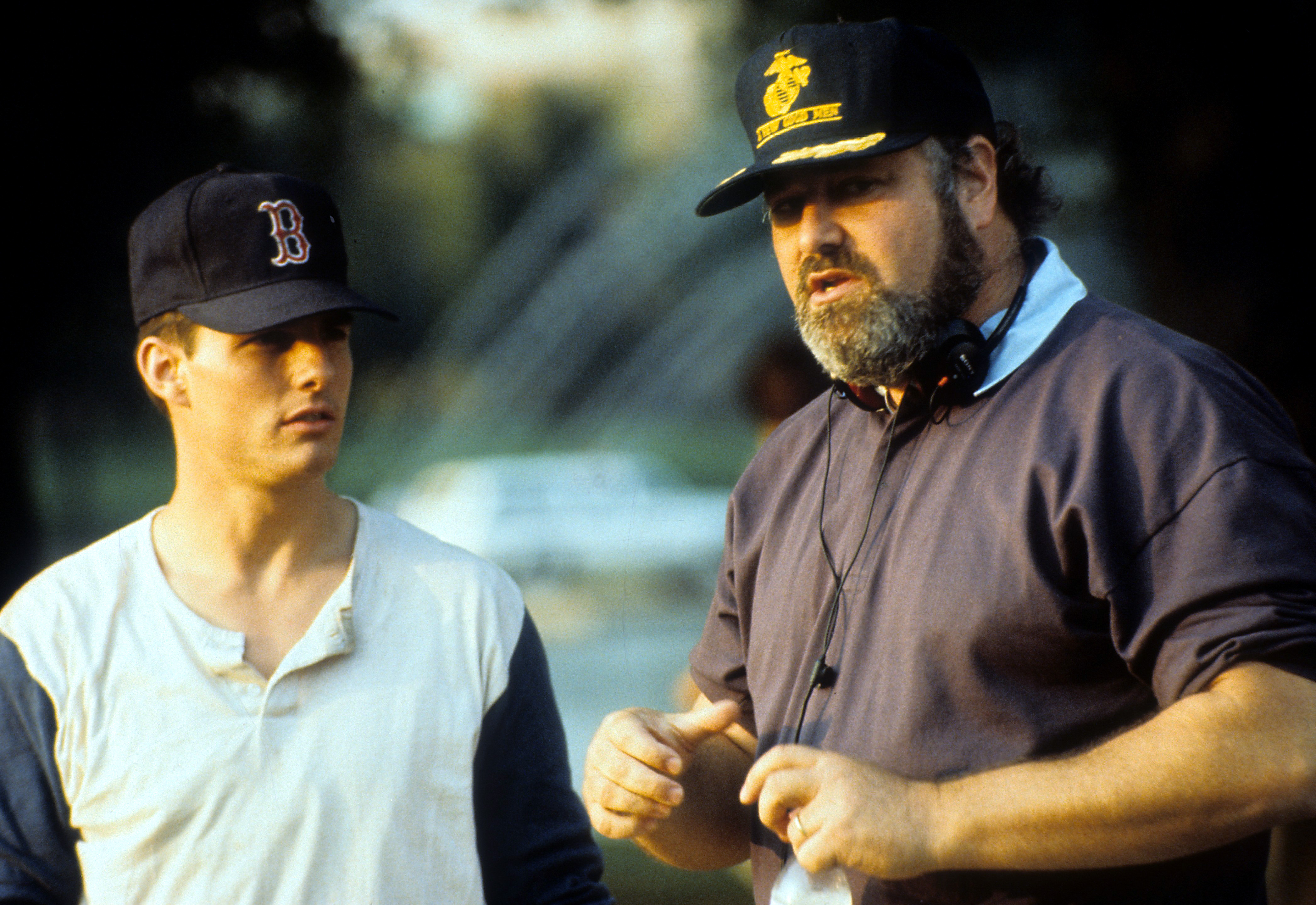 Tom Cruise listening to Director Rob Reiner in between scenes from the film 'A Few Good Men', 1992. (Photo by Columbia Pictures/Getty Images)