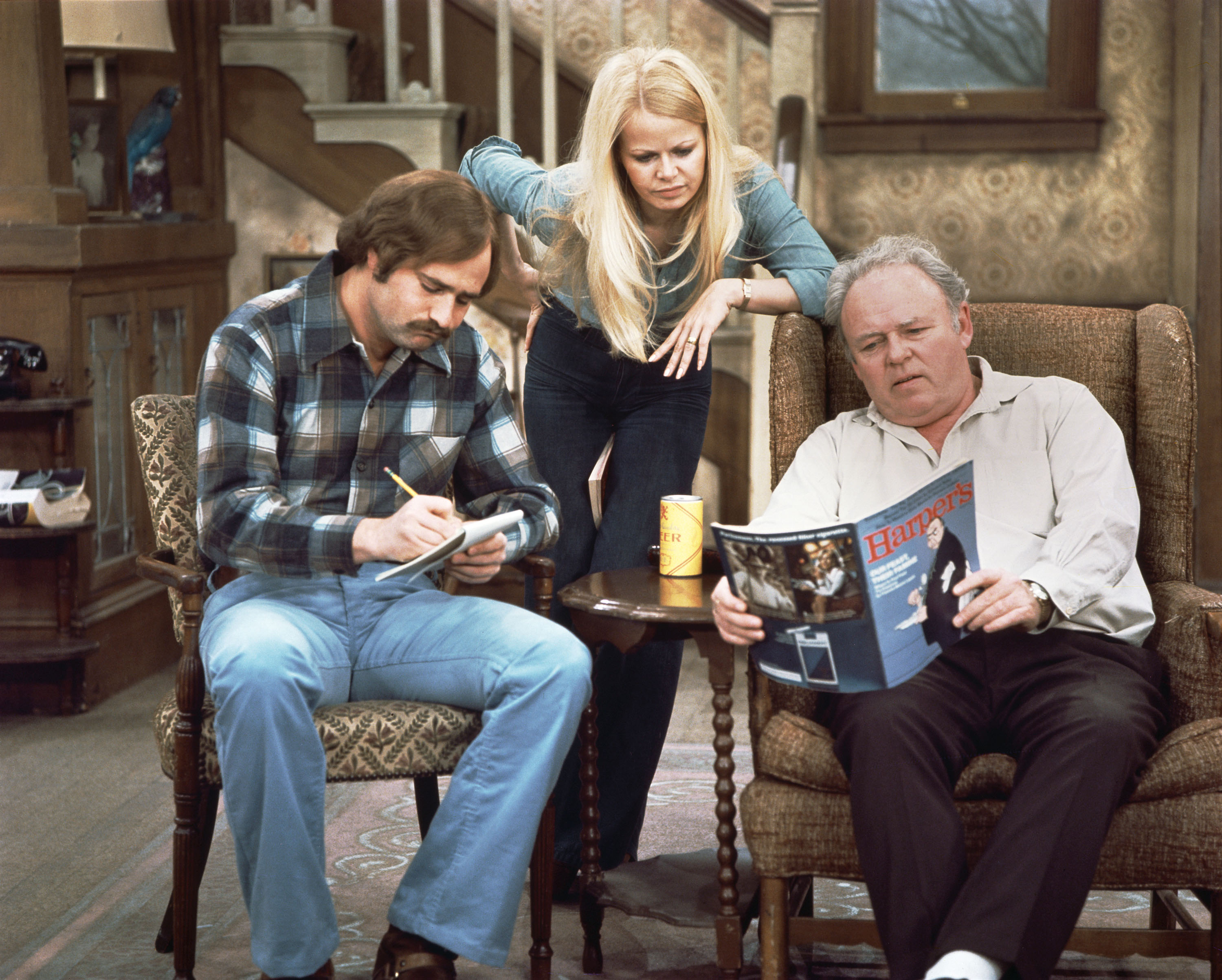 LOS ANGELES - JANUARY 1: Cast members, from left, Rob Reiner as Michael Stivic, Sally Struthers as Gloria Bunker-Stivic and Carroll O'Connor as Archie Bunker on the CBS television network series "All in the Family". Image dated September 1975. (Photo by CBS via Getty Images)