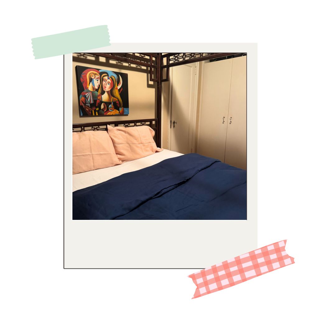 casa parini bedding set with pink pillowcases, blue duvet cover, and white fitted sheet