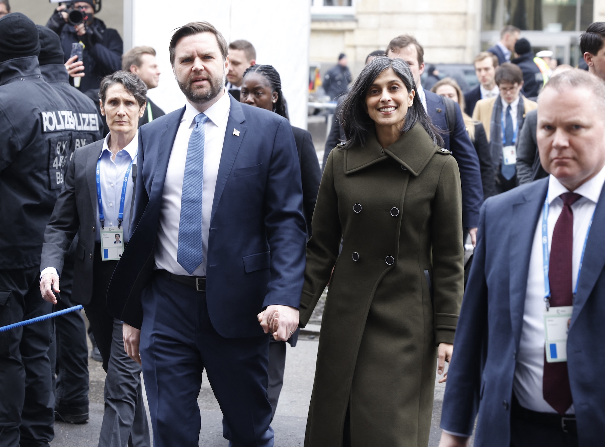 US Vice President JD Vance (L) and his wife Usha Vance arrive for the 61st Munich Security Conference (MSC) in Munich, southern Germany on February 14, 2025.