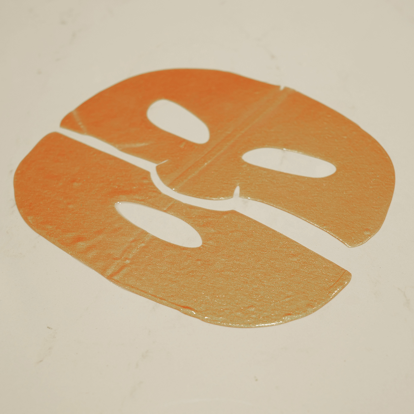gold face mask on marble surface that our editors tested