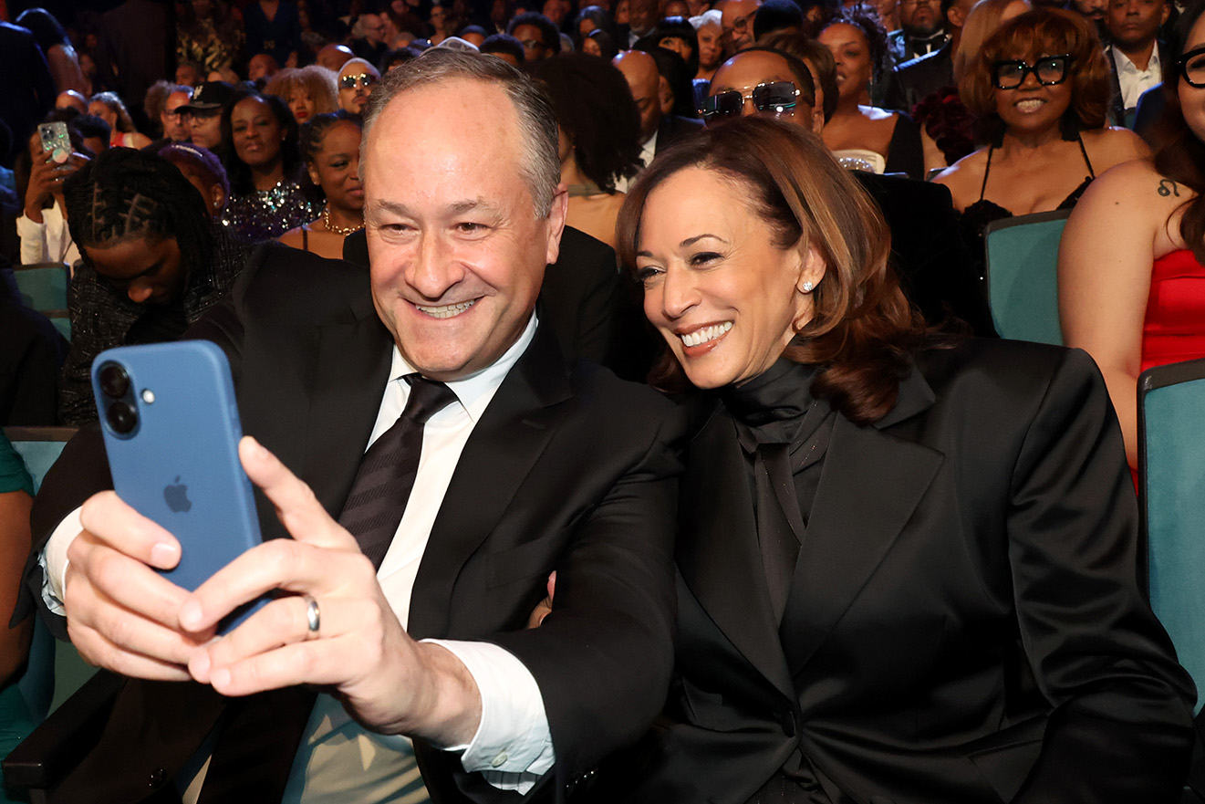 PASADENA, CALIFORNIA - FEBRUARY 22: (L-R) Doug Emhoff and Former Vice President Kamala Harris pose for a selfie photo during the 56th NAACP Image Awards at Pasadena Civic Auditorium on February 22, 2025 in Pasadena, California. (Photo by Johnny Nunez/Getty Images for BET)