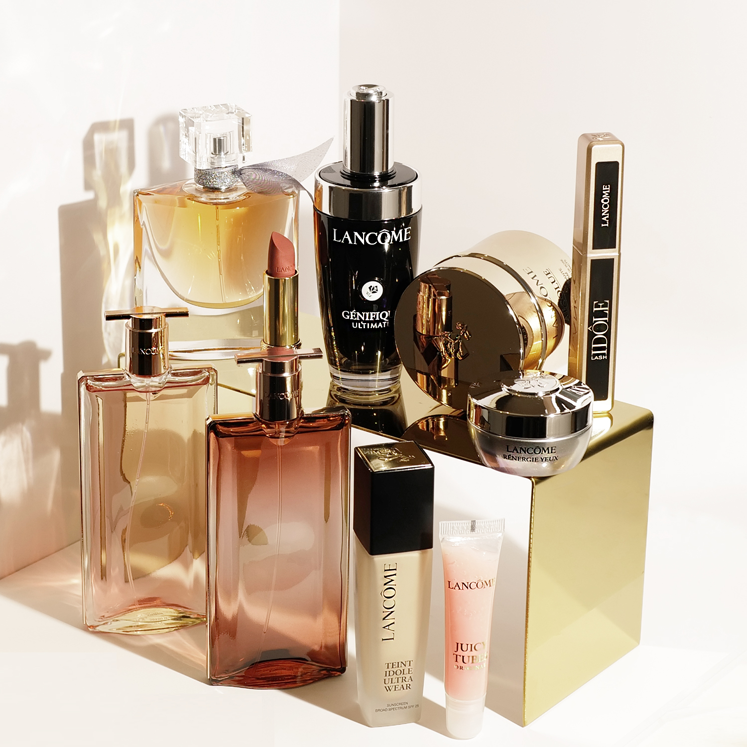 several of the best lancome products photographed together on white with gold display that editors tested and reviewed.