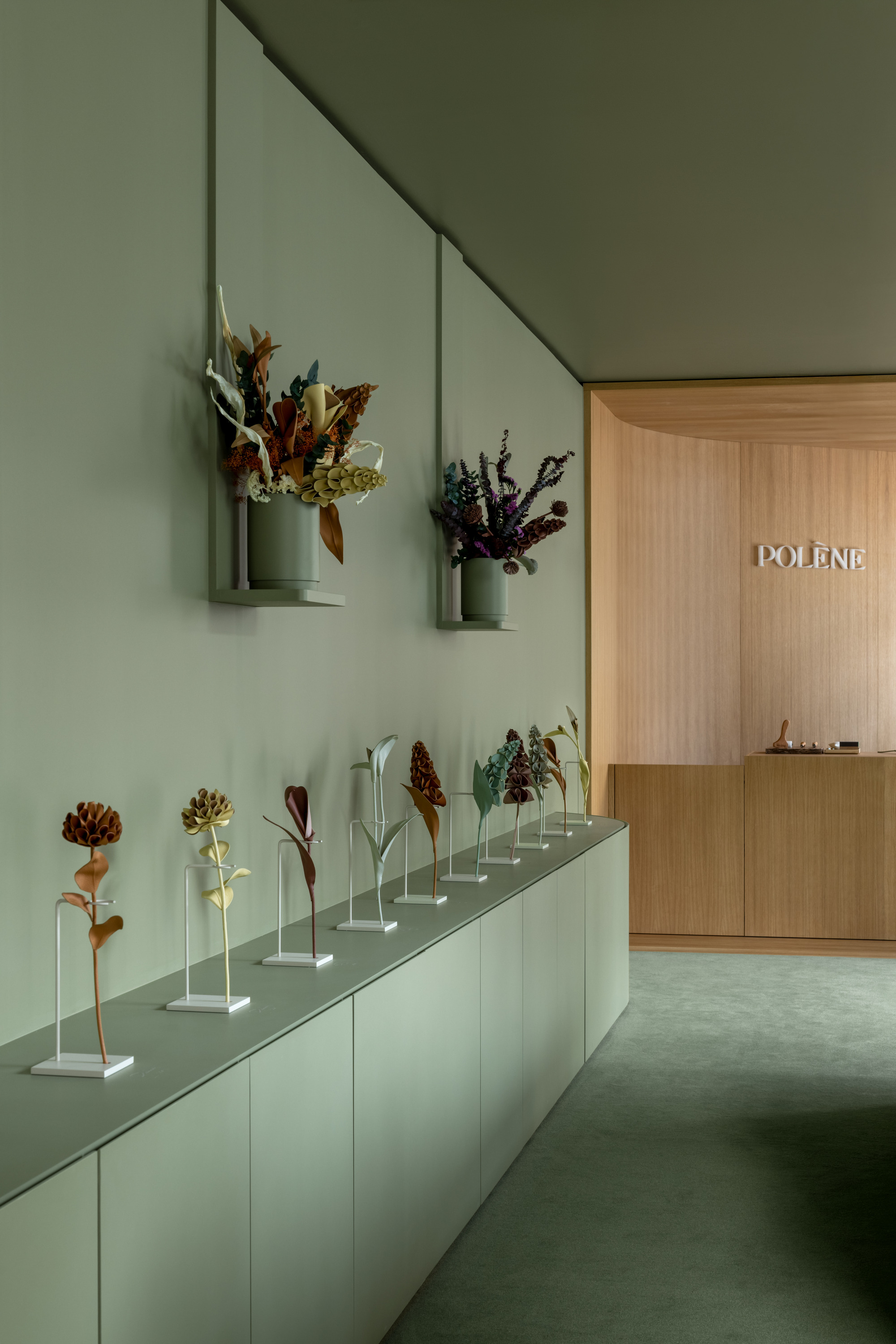 Individual Polene leather flowers and finished bouquets that also include dried flowers.