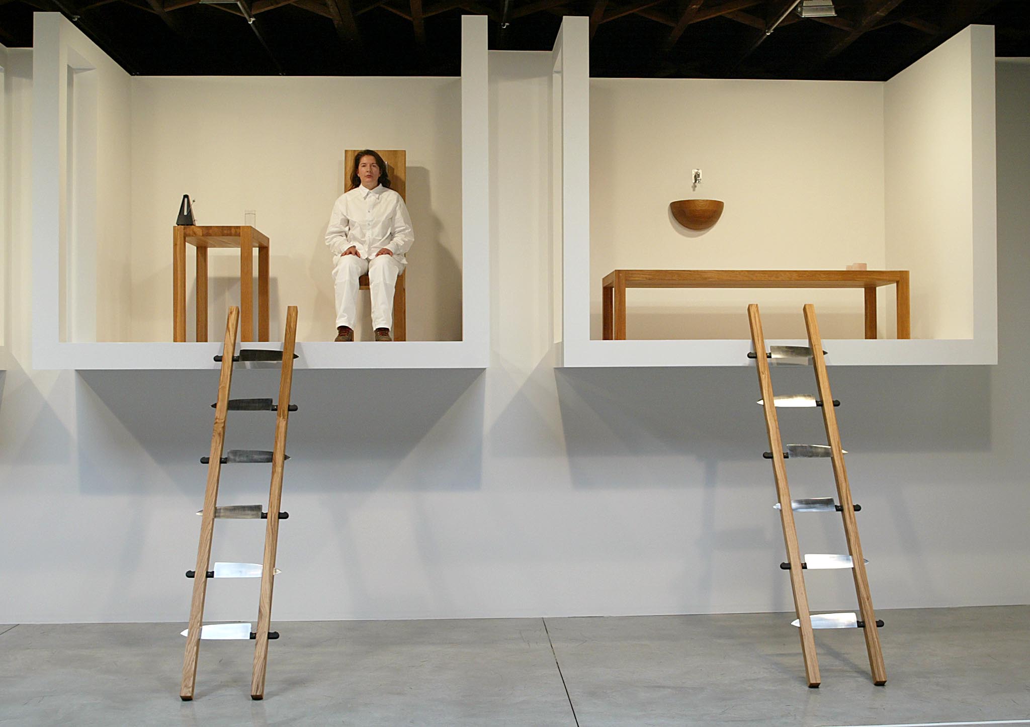 NEW YORK, UNITED STATES:  Artist Marina Abramovic sits in her exhibition called