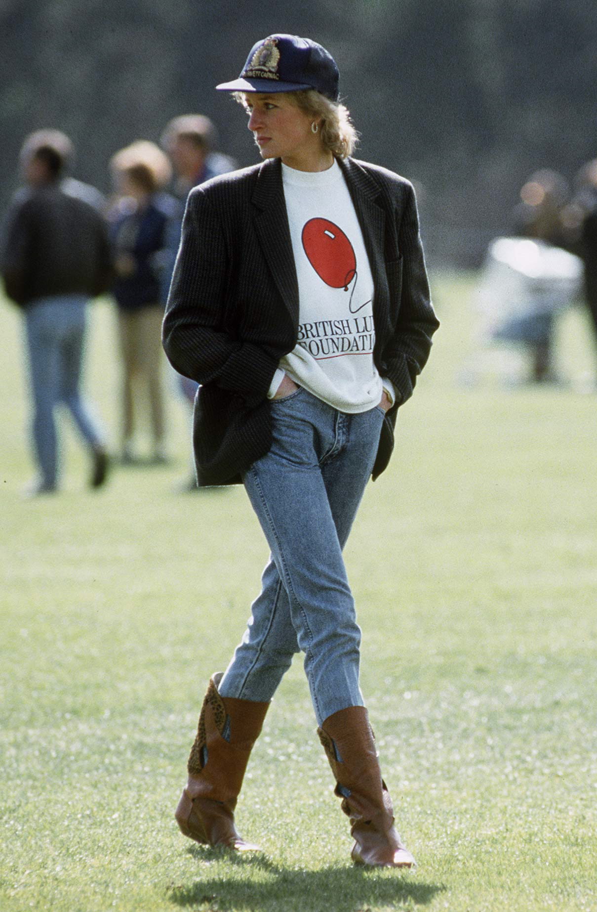 WINDSOR, UNITED KINGDOM - MAY 02:  Diana, Princess Of Wales At Guards Polo Club.  The Princess Is Casually Dressed In A Sweatshirt With The British Lung Foundation Logo On The Front, Jeans, Boots And A Baseball Cap.  (Photo by Tim Graham Photo Library via Getty Images)