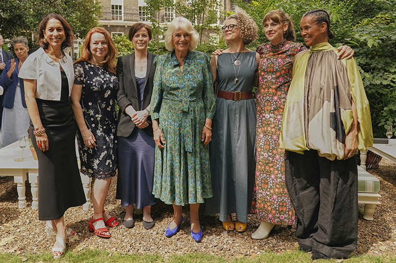 LONDON, ENGLAND - JUNE 11: Britain's Queen Camilla, centre, poses with the Nonfiction short list authors suring the Women's Prize for Fiction and Nonfiction event  on June 11, 2025 in London, England. (Photo by Alberto Pezzali - WPA Pool/Getty Images)