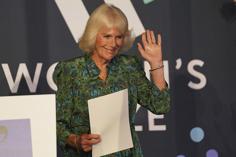 LONDON, ENGLAND - JUNE 11: Britain's Queen Camilla waves to the audience after making a speech as she attends the Women's Prize for Fiction and Nonfiction event  on June 11, 2025 in London, England. (Photo by Alberto Pezzali - WPA Pool/Getty Images)