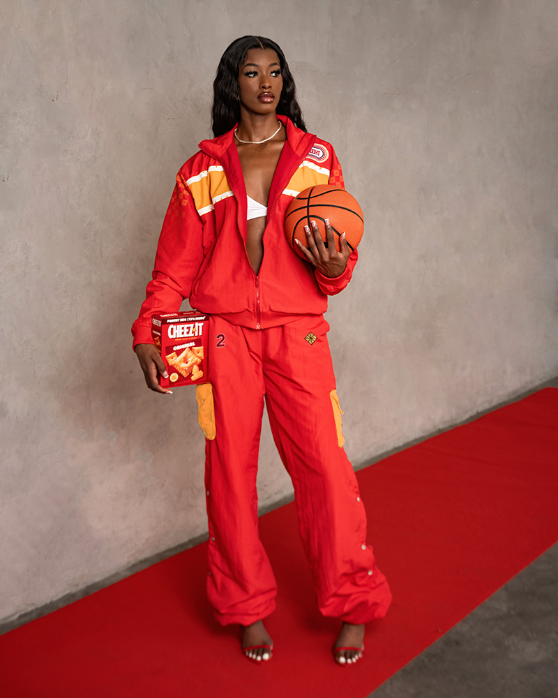 Richea Jackson wears Cheez-Fitz custom tunnel walk outfit designed by stylist Brittany Hampton.