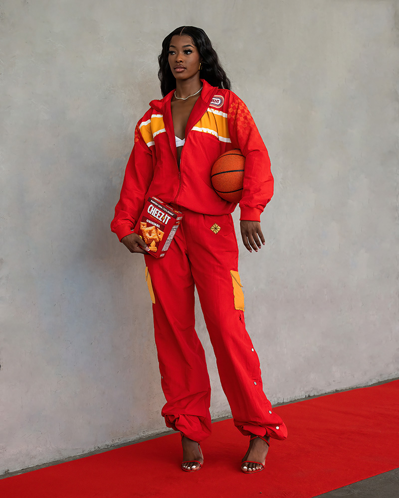 Richea Jackson wears Cheez-Fitz custom tunnel walk outfit designed by stylist Brittany Hampton.
