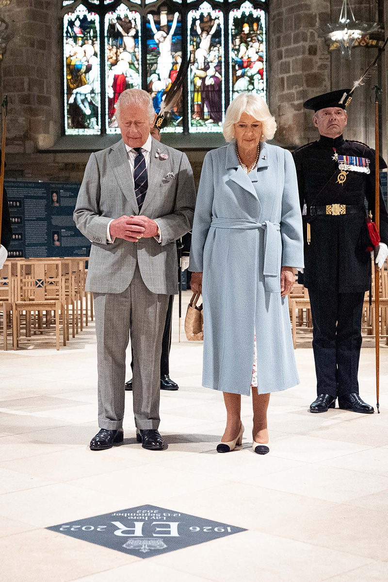 EDINBURGH, SCOTLAND - JULY 2: King Charles III and Queen Camilla unveil a memorial stone for Queen Elizabeth II in St Giles Cathedral in Edinburgh, where she was laid at rest before being taken to London, as part of their trip to Scotland for Holyrood Week on July 2, 2025 in Edinburgh, Scotland. King Charles III and Queen Camilla are visiting Scotland with members of the Royal Family for a Royal Week until Friday, July 04. (Photo by Aaron Chown - WPA Pool/Getty Images)