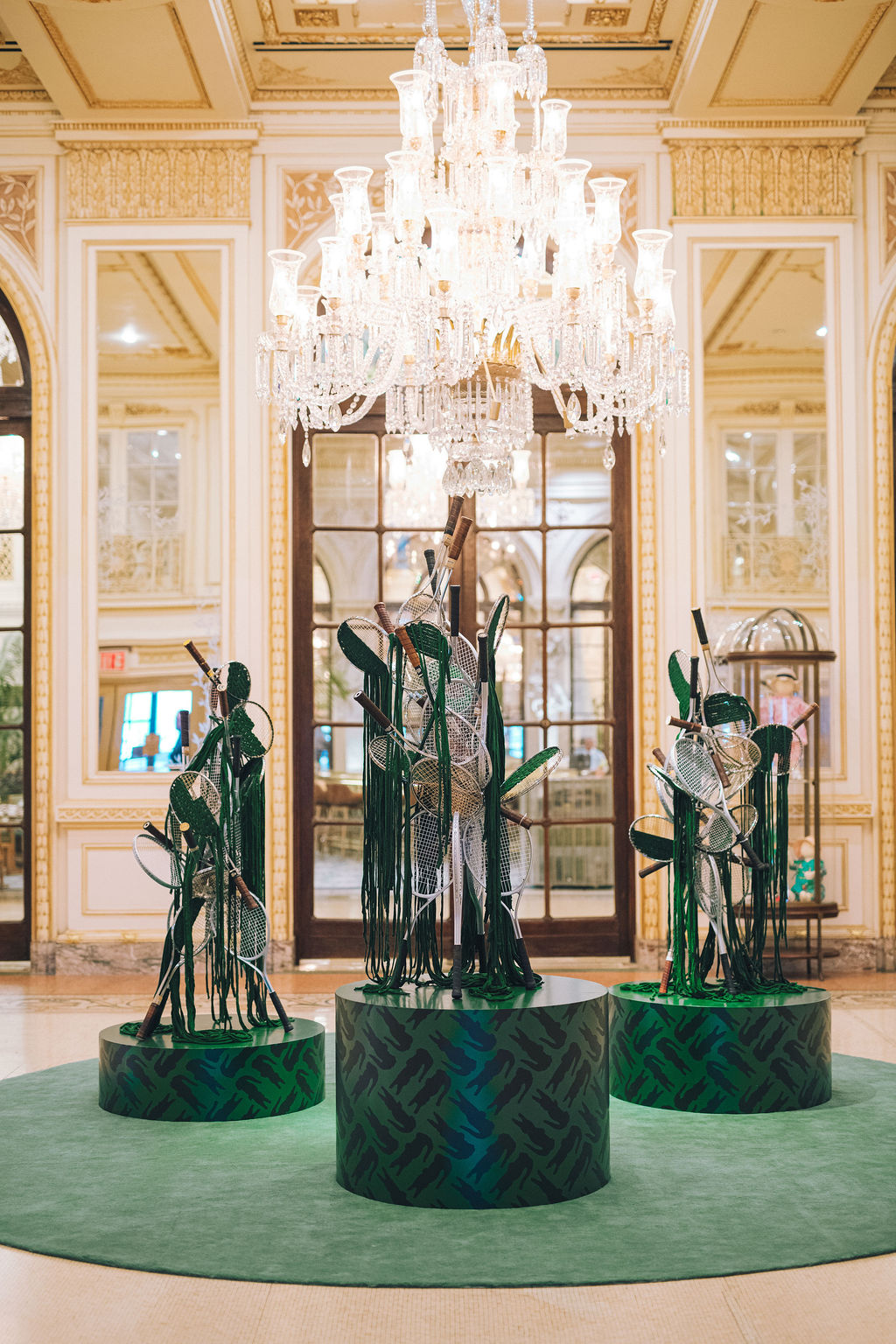 Lacoste tennis sculpture in the Plaza's lobby.