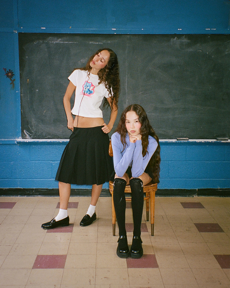two models in Danielle Guizio's eponymous label collaboration with K-pop girl group Le Sserafim