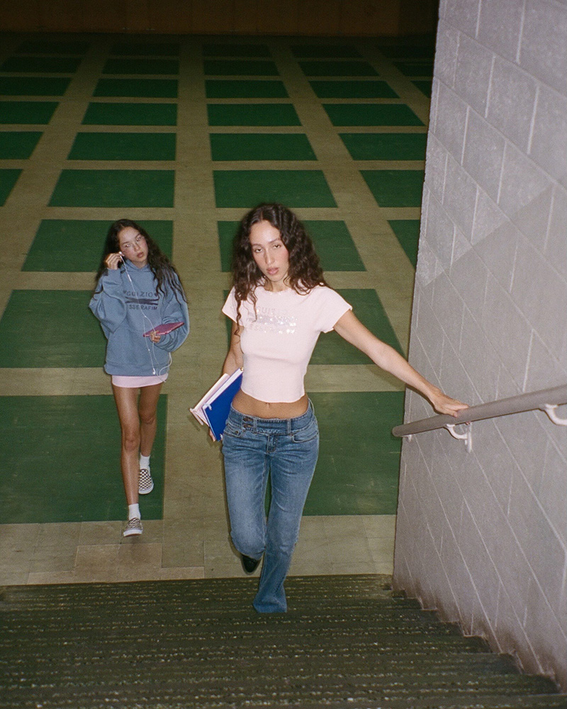 two models in Danielle Guizio's eponymous label collaboration with K-pop girl group Le Sserafim