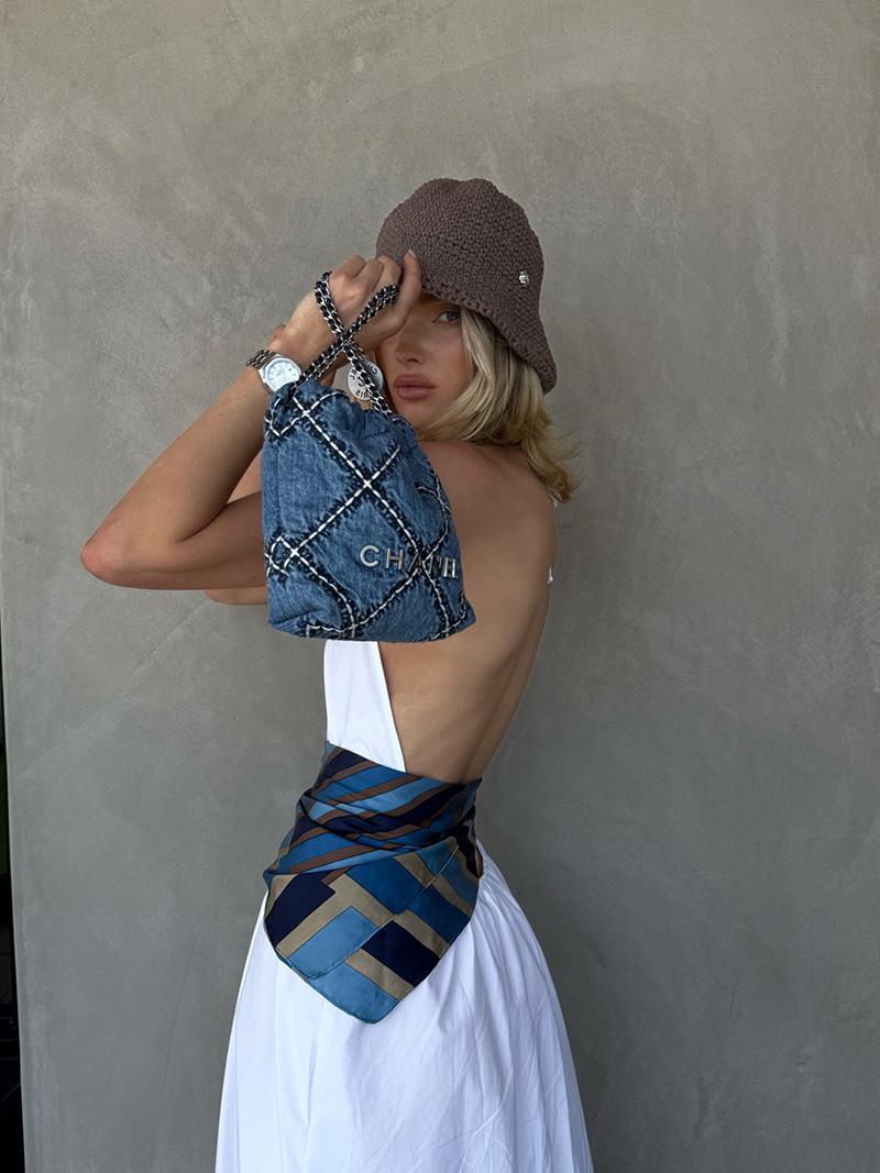 Elsa Hosk models designer jewelry and handbags for her capsule collection with Reklaim.