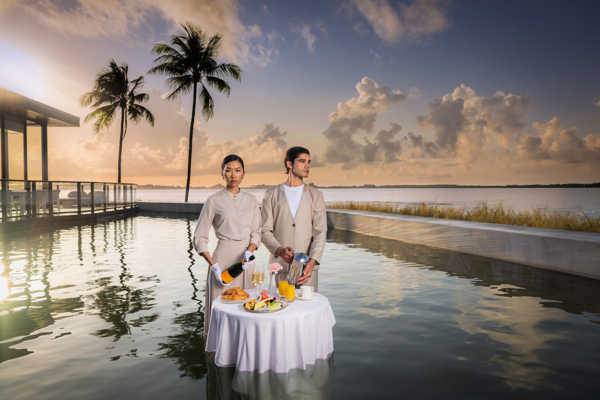 Jason Wu has partnered with The Residences at Mandarin Oriental, Miami to design bespoke uniforms for the property’s striking sales gallery staff—a collaboration that reimagines the “work uniform” through the lens of couture.