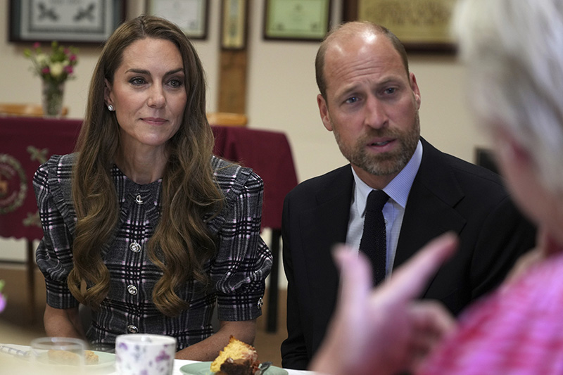 Kate Middleton wears a wide collar Alessandra Rich dress during a visit to the National Federation of Women's Institute (WI) to commemorate the three-year anniversary of the death of Queen Elizabeth II on Sept. 8, 2025 in Sunningdale, England.