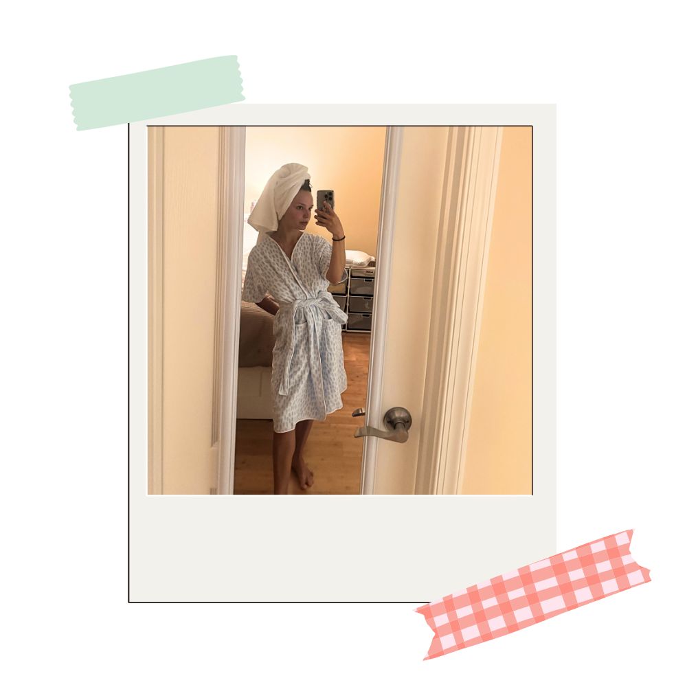 writer testing out weezie's short sleeve robe in blue