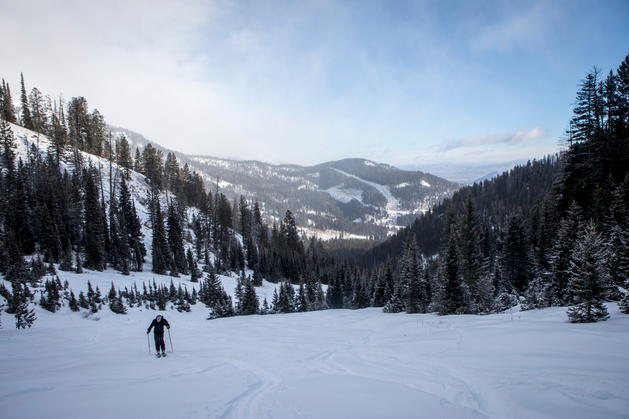 Rob Denton skins back uphill while backcountry skiing in the Tetons on Dec. 10, 2021 in Jackson Hole, Wyo.(AMBER BAESLER for The Washington Post via Getty Images)