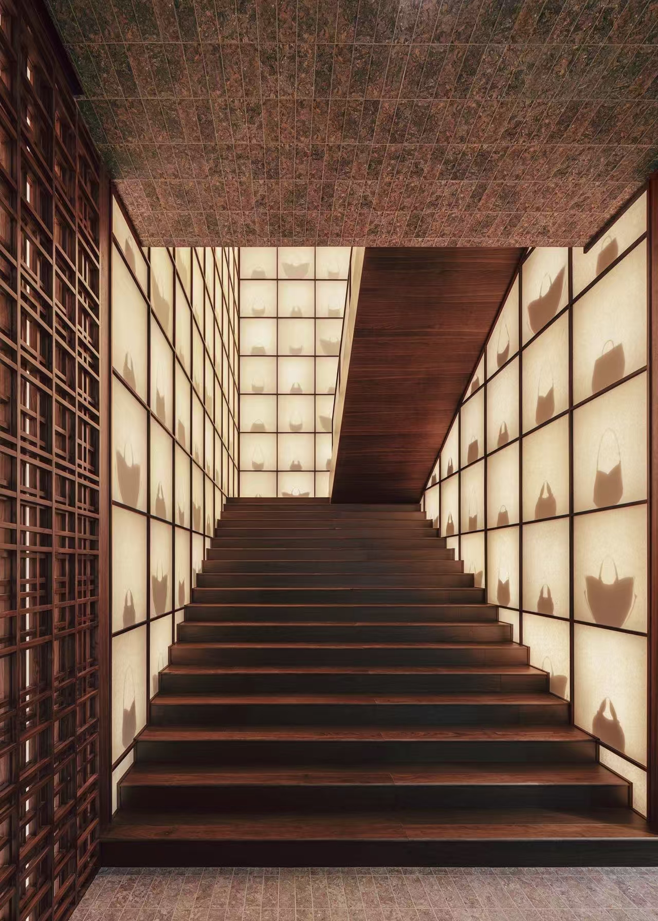 Polène Beijing store's staircase design pays homage to Chinese shadow puppetry.