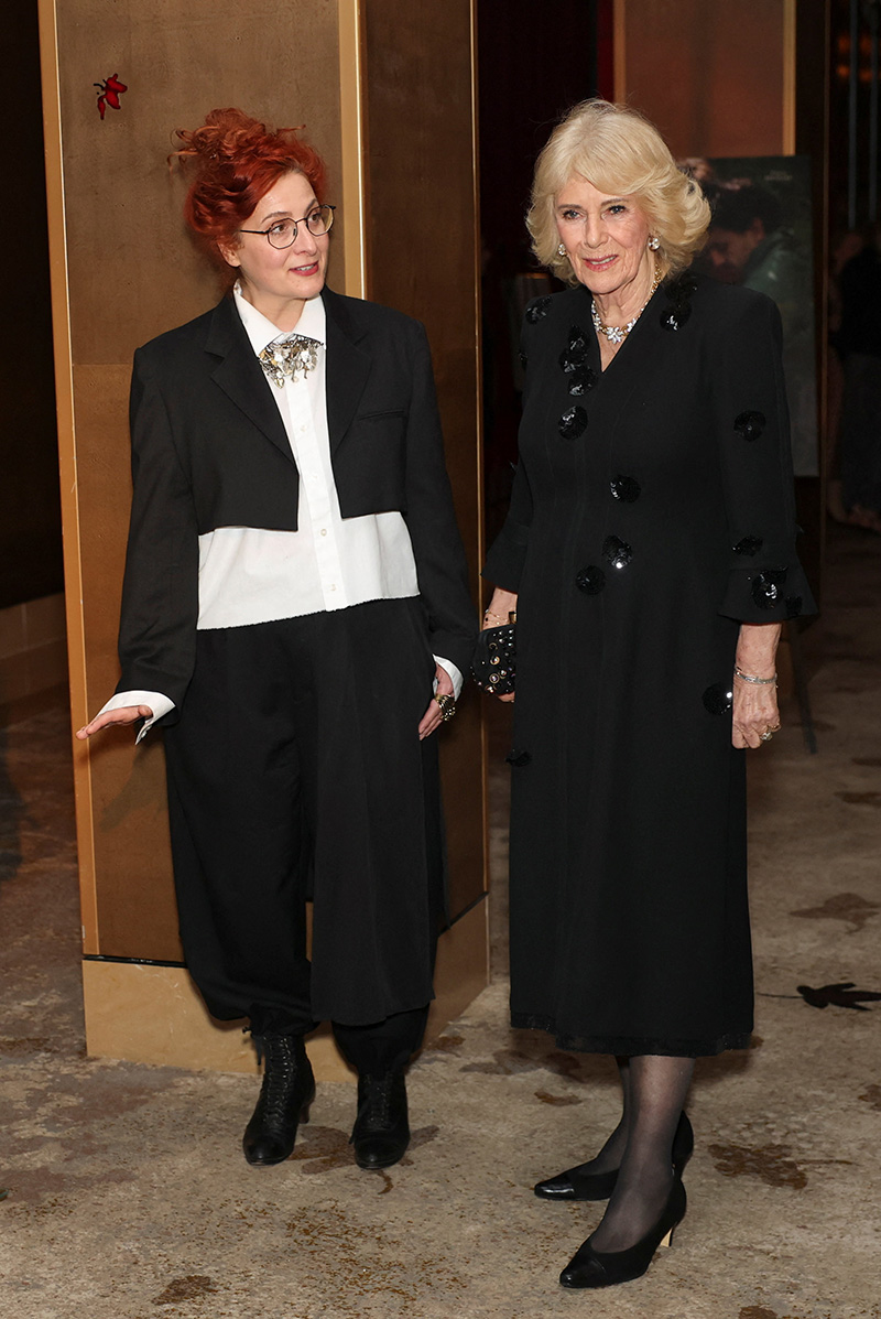 Queen Camilla wears Anna Valentine at a special screening of