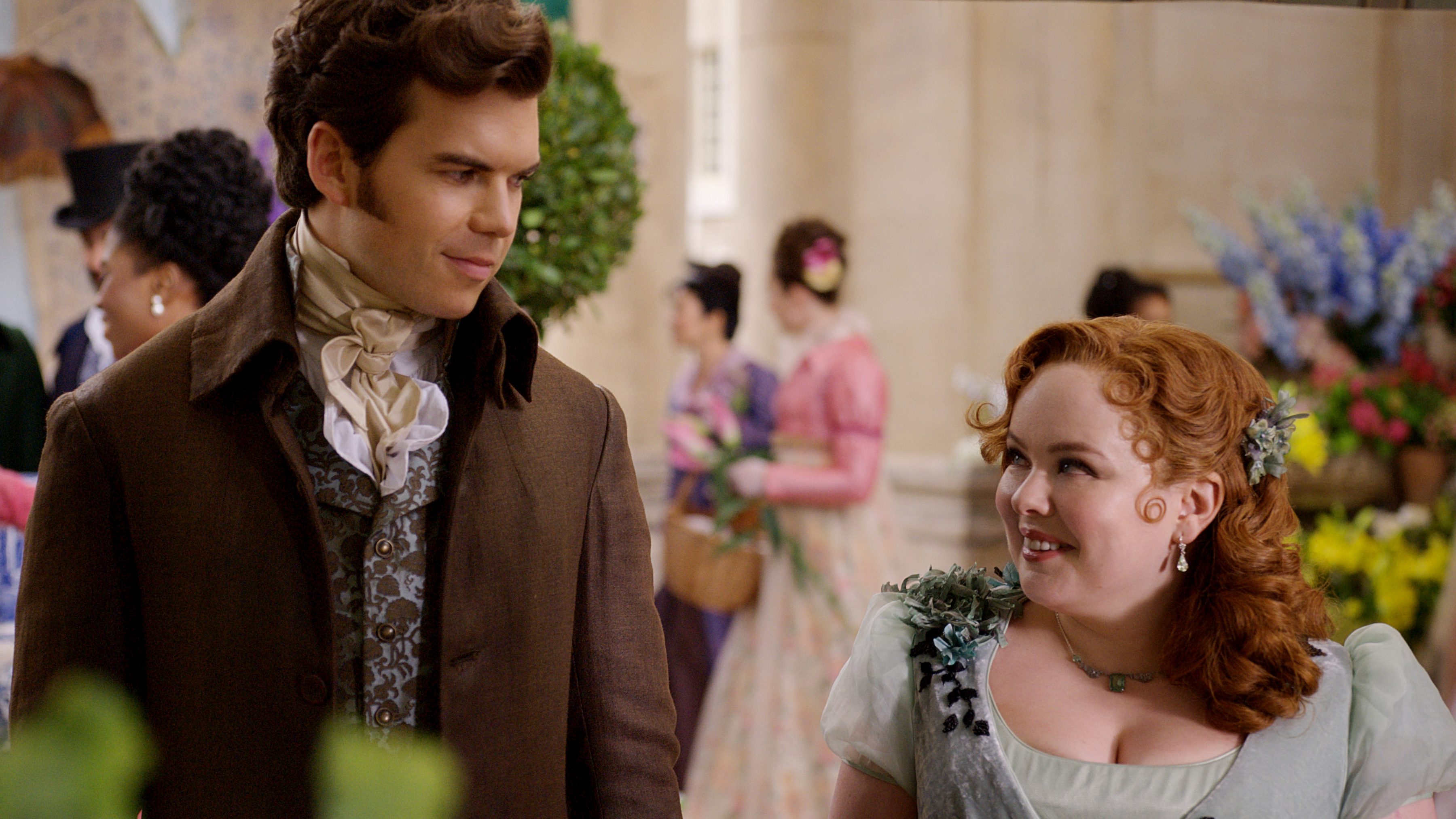 Bridgerton. (L to R) Luke Newton as Colin Bridgerton, Nicola Coughlan as Penelope Featherington in episode 10 of Bridgerton. Cr. Courtesy of Netflix © 2023