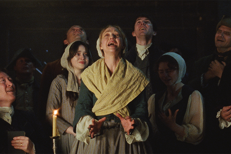 From L to R: Stacy Martin, Scott Handy, Viola Prettejohn, Lewis Pullman, Amanda Seyfried, Matthew Beard, and Thomasin McKenzie in THE TESTAMENT OF ANN LEE. Photo courtesy of Searchlight Pictures. © 2025 Searchlight Pictures All Rights Reserved.