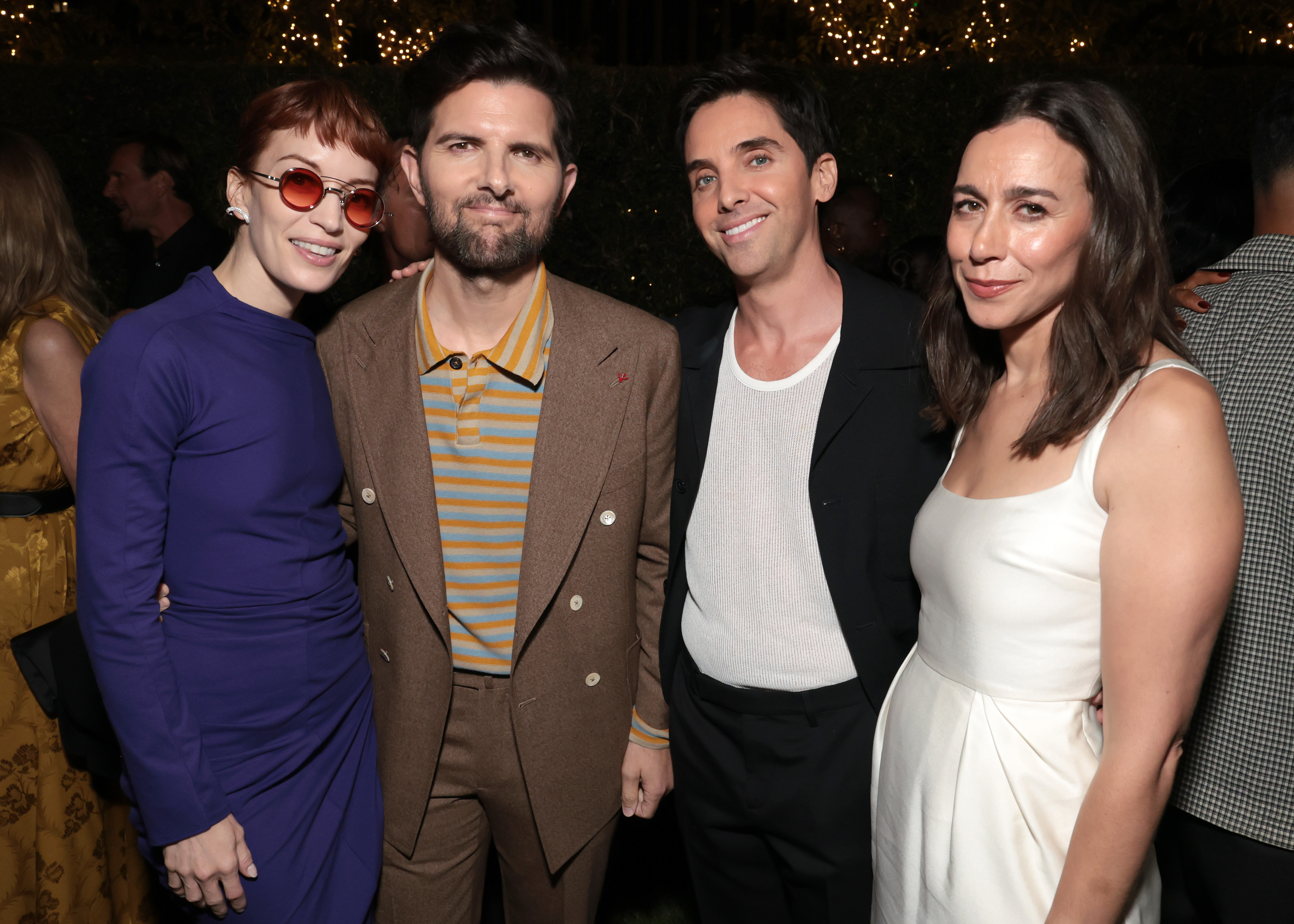 LOS ANGELES, CALIFORNIA - SEPTEMBER 13: (L-R) Britt Lower, Adam Scott, Paul W. Downs, and Lucia Aniello attend MPTF's 19th Annual Evening Before at Century Park on September 13, 2025 in Los Angeles, California. (Photo by Kevin Mazur/Getty Images for MPTF)