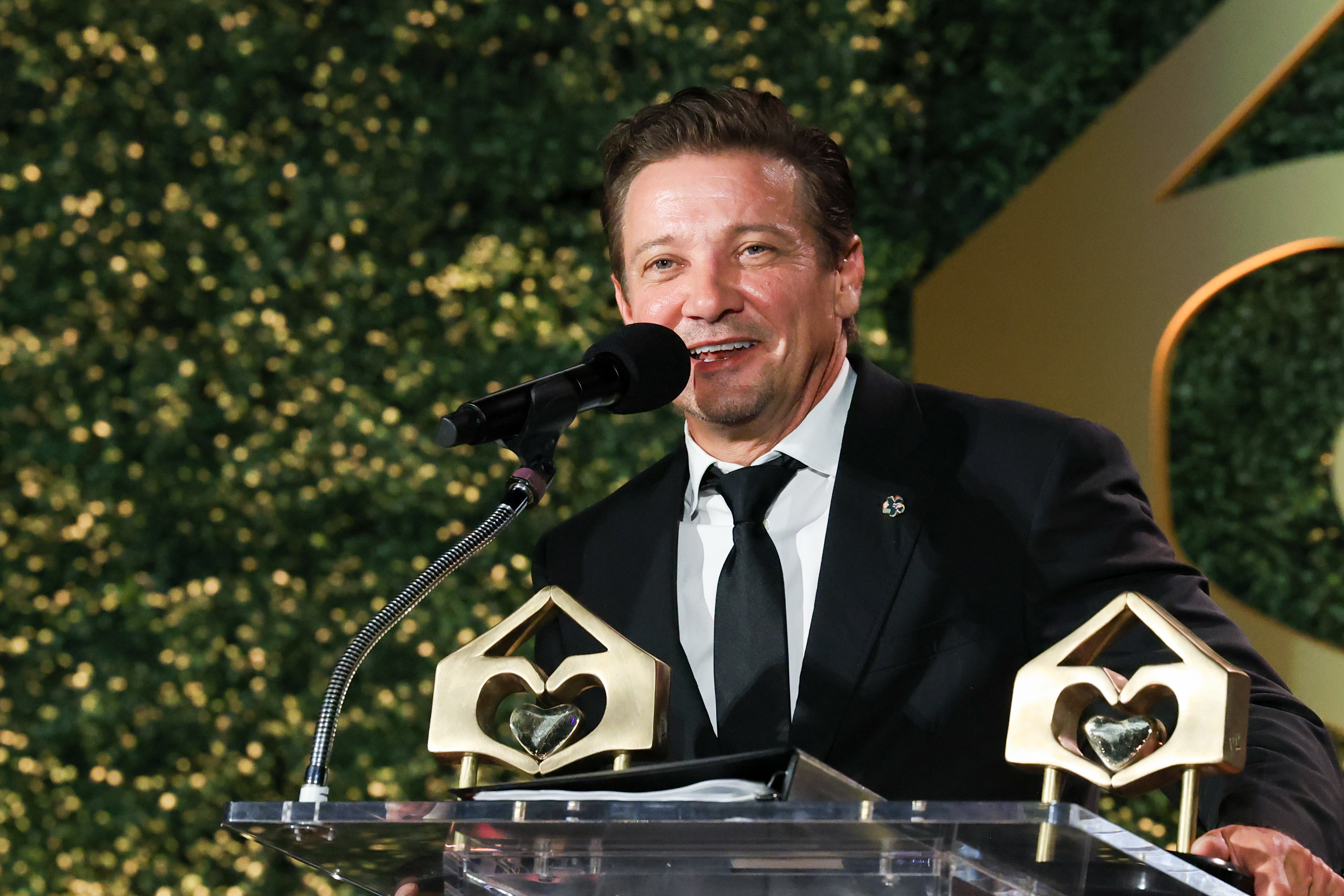 Jeremy Renner speaks onstage at the A Sense of Home 10th Anniversary Gala held at Pacific Design Center on October 04, 2025 in West Hollywood, California. (Photo by Jesse Grant/Variety via Getty Images)