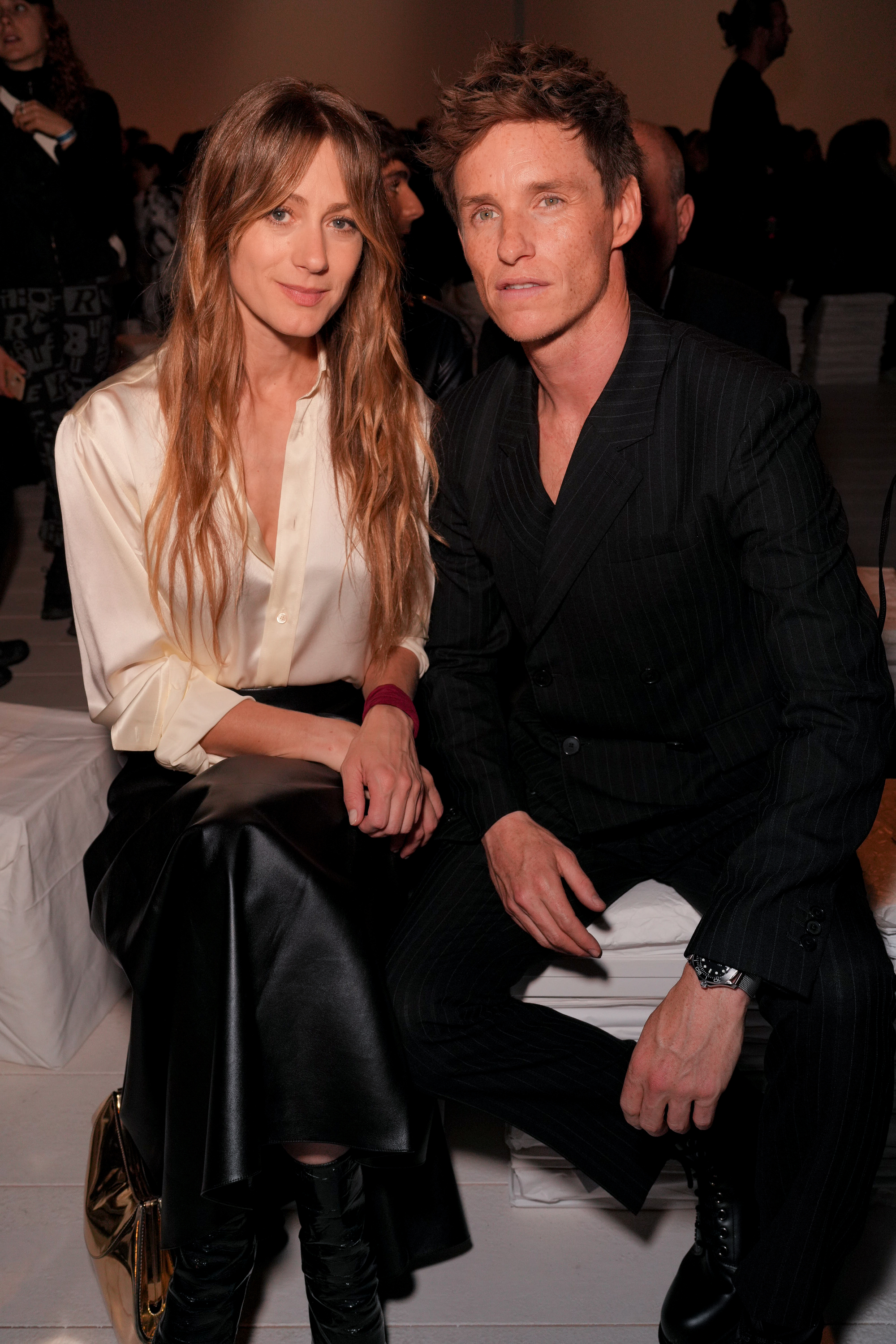 Hannah Bagshawe, Eddie Redmayne at the Givenchy fashion show as part of Spring/Summer 2026 Paris Fashion Week on October 03, 2025 in Paris, France.