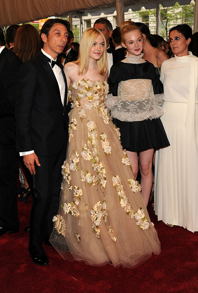 Pierpaolo Piccioli of Valentino, actresses Dakota Fanning, Elle Fanning and designer Maria Grazia Chiuri of Valentino attend the