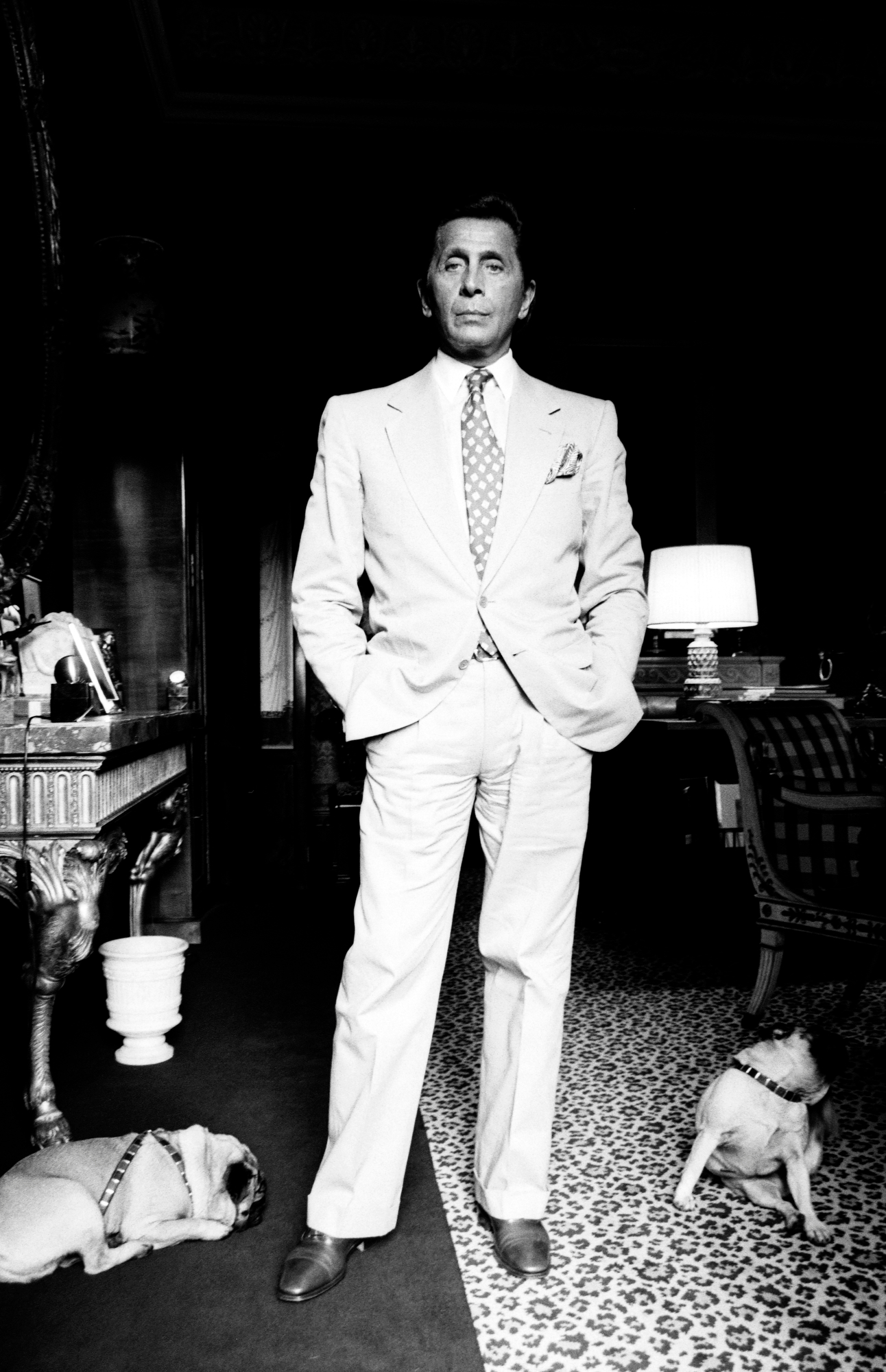 Valentino Garavani, accompanied by his two pugs, poses for portraits on June 9, 1992.