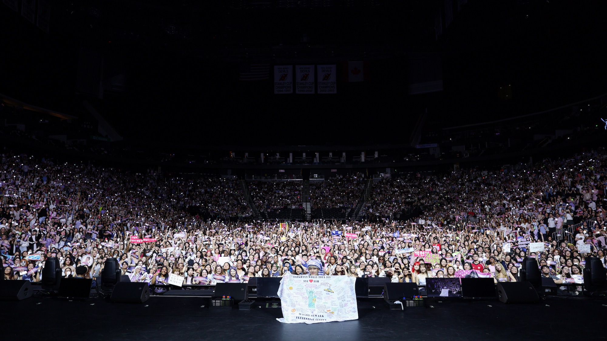 Baekhyun onstage at the Prudential Center for his