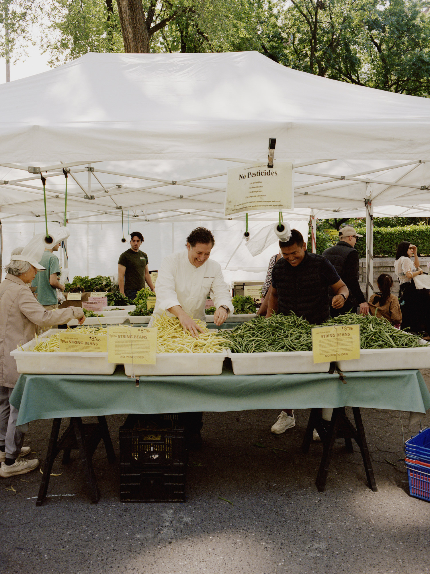 The chef of the Waldorf’s Lex Yard, Michael Anthony, shopping for produce at the Union Square farmer’s market.