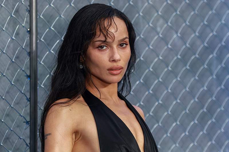 Zoë Kravitz wears a custom satin black and white Saint Lauren at the