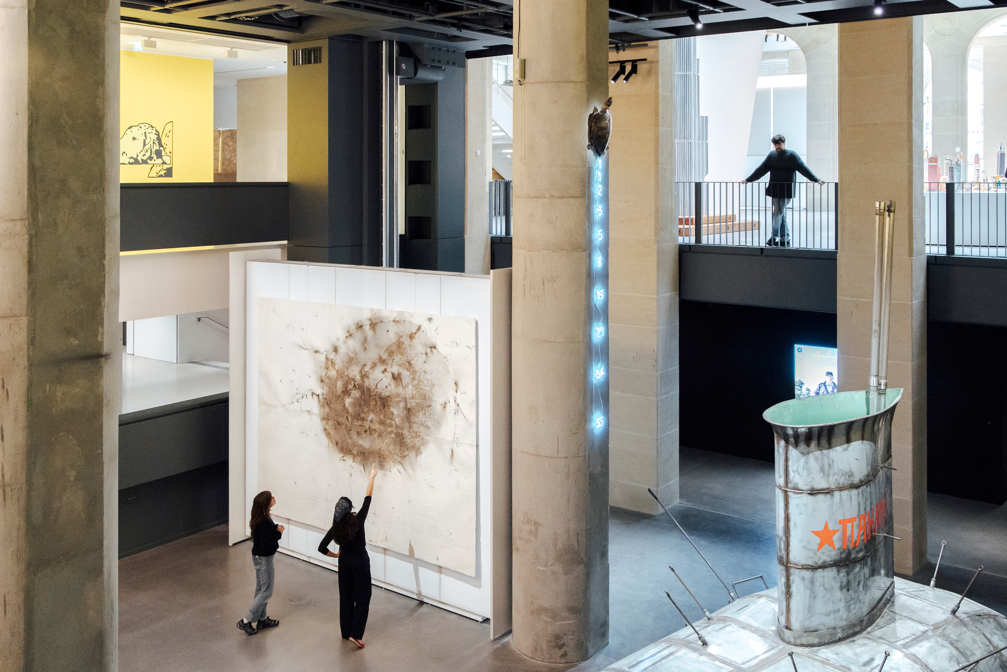 Exhibition view. Cai Quo-Qiang’s “The Earth Has its Black Hole Too: Project for Extraterrestrials No. 16,” Mario Merz’s “Tartaruga,” and Panamarenko’s “Panama, Spitzbergen, Nova Zemblaya.”
